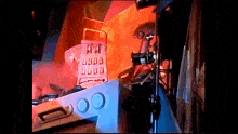 a person is standing in front of a grater that says " aaa " on it