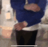 a blurry picture of a person wearing a watch