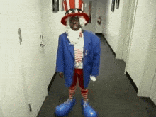a man dressed in an uncle sam costume is walking down a hallway
