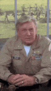 a man in a military uniform has a name tag on his chest that says ' william ' on it