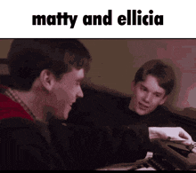 two young men are sitting next to each other and the words matty and elicia are above them