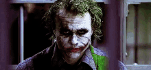 Smirk - Joker GIF - Joker Batman Dc Comics GIFs
