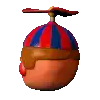 a pixel art of a clown with a red and blue hat on .