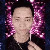 a man wearing ear buds stands in front of a purple background with hearts