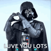 darth vader is making a heart shape with his hands and the words `` love you lots '' .