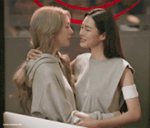 two women looking at each other with the words lingormgifss written below them