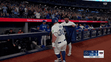 a baseball player with the number 30 on the back of his uniform