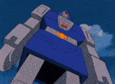 a blue and white robot with an orange cross on the chest
