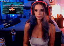 a woman wearing red headphones has a daily goal of 2/30