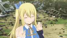 a girl with blonde hair and a blue bow on her hair is making a funny face