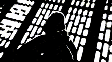 a silhouette of darth vader in front of a screen that says aunte on it