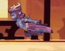 a cartoon character with horns is flying in the air .
