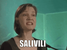 a woman is making a funny face with the words hiljaalleen written on the bottom