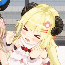 a cartoon character with horns and a heart on her hair