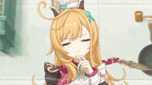 a girl with long blonde hair is wearing a crown