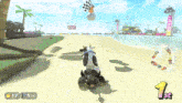 a video game screen shows a cow driving a go kart on a beach and the number 1 is on the screen