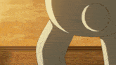 a close up of a cartoon character 's butt with a circle on it