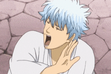 a cartoon character is yawning and covering his mouth with his hand