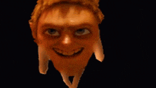 a close up of a person holding a gun with a cartoon face on it