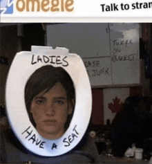 a woman in a toilet seat with the words ladies have a seat written on it