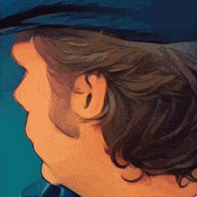 a close up of a man 's ear and hair