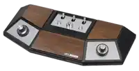 a very old ufc video game controller with a wooden base