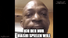 a close up of a man 's face with a caption that says `` ich der nur hiashi spielen will ''