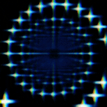 a dark blue background with a circular pattern of lights