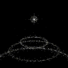 a black background with a circle of white dots