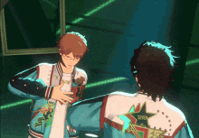 a man in a seven stars jacket stands next to another man