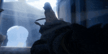a man with a sword is standing in front of an archway