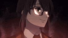a close up of a person wearing glasses and a red tie .
