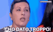 a woman says tho dato troppo on a television screen