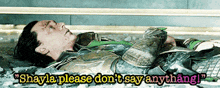 a man laying on the ground with the words " shayla please don t say anything "