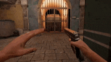 a person is holding a gun in a video game and it is being fired