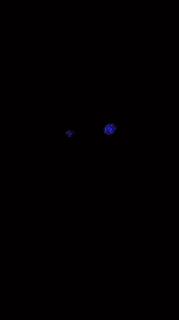 a close up of a person with glowing blue eyes