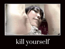 a picture of a woman with the words " kill yourself " on the bottom
