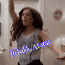 a woman is dancing with the words hobahh allstar written on her arm