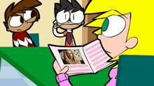 a girl is reading a magazine with a picture of a girl on it
