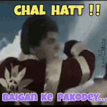 a man in a black and white striped shirt with the words " chal hatt " written above him