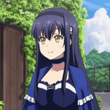 a girl in a blue dress has a skull and crossbones on her head