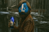 a man with a beard has a blue face painted with the letter l