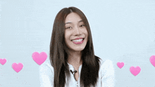 a woman surrounded by pink hearts with the word daring in the corner