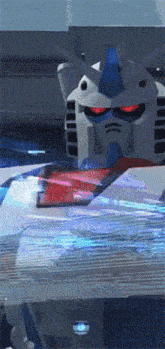 a robot with red eyes and a blue and white head