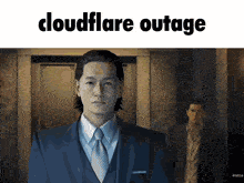 a picture of a man in a suit and tie with the words cloudflare outage above him