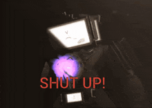 a screen with the words shut up written in red