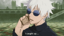 a man talking on a cell phone with the words i caught up