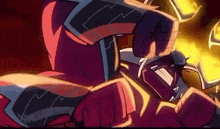 a close up of a cartoon character 's fist being punched in the face .