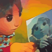a cartoon character is looking at a picture of a man