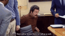 a man with a mustache is sitting in a chair and says there will be alcohol there so i will go as well
